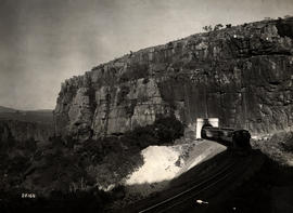 Waterval-Boven. A train leaving one of the tunnels on the realigned railway line to Waterval-Onde...