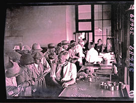 "Kimberley, 1929. Visitor in the diamond sorting room."
