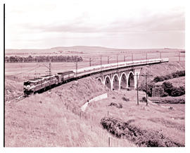Natal. Drakensberg Express with two SAR Class 5E's on the viaduct between Pentrich and Umlaas Roa...