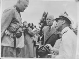 Pretoria, 29 March 1947. King George VI speaks to miiltary veteran at Louis Botha statue.