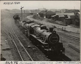 Port Elizabeth, 1950. SAR Class 24 with freight train.