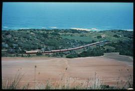 
Passenger train on a hill close to the sea. (Mossel Bay - George?)

