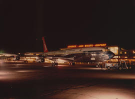 Johannesburg, 1970. Jan Smuts Airport. SAA Boeing 707 ZS-SAI 'East London' on  apron at night.