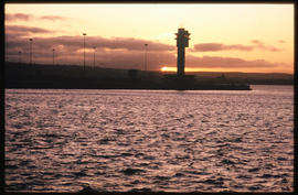 Port Elizabeth, October 1983. Port Elizabeth Harbour at sunset. [T Robberts]