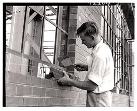 "Pretoria, 1962. Apprentice bricklayer at SAR workshops at Koedoespoort."