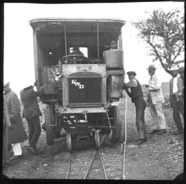 Naboomspruit district, 1925. SAR FWD roadrail railcar with Dutton's patent sign above the radiato...