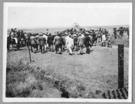 Derby, 19 August 1919. Group of men with General Botha in open veld.