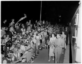 Ficksburg, 12 March 1947. Royal Family walking past welcoming crowds.