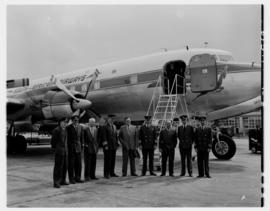March 1956. SAA Douglas DC-7B ZS-DKD 'Dromedaris' with crew and others.