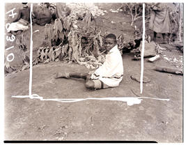 Transkei, 1940. Young boy sitting.