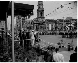 Durban, 22 March 1947. King George VI salutes ex-servicemen as they march past the dais in front ...