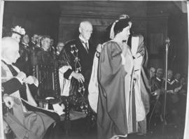 Cape Town, 22 April 1947. Queen Elizabeth is robed on receipt of honorary doctorate from Universi...