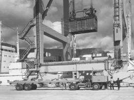 Cape Town, 1977. Container wharf crane loading truck at BJ Schoeman dock in Table Bay harbour.