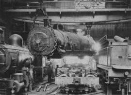 Pretoria, 1958. Mallett boiler on sling in locomotive workshop.