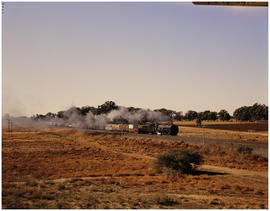 Free State, 1984. SAR Class 25NC on goods train near Modder River. [D Dannhauser]