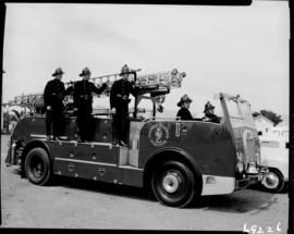 Worcester, 1960. Dennis fire engine with crew.