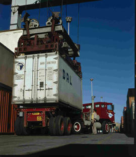 Johannesburg, 1982. Container being loaded onto truck at City Deep container depot.