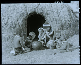 Zululand, 1957. Zulu toddlers in front of hut.
