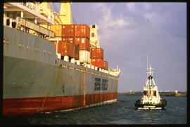 East London, March 1986. SAR pilot boat 'HTV Horner' alongside container ship in Buffalo Harbour....