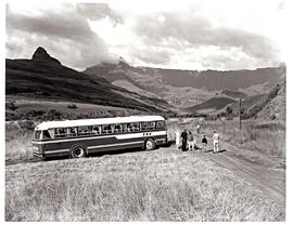 Drakensberg, 1966. SAR Leyland Olympic tour bus No MT16937 parked next to country road.