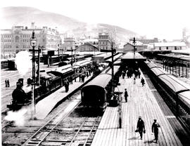 Cape Town, circa 1906. CGR 6th Class about to leave with passenger train.