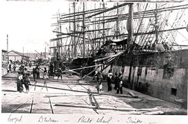 Durban. Timbers being loaded by hand from large sailship at St Pauls wharf.