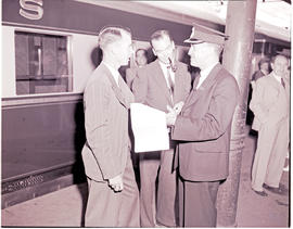 "1946. Blue train ticket examiner."