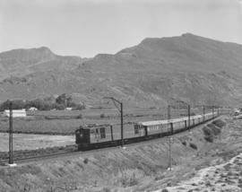 De Doorns district, 1963. SAR Class 4E hauling 2up Blue Train at Sandhills in the Hex River valley.
