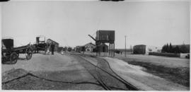 Victoria West (later Hutchinson), 1895. Station in background with ox wagons in the foreground. (...