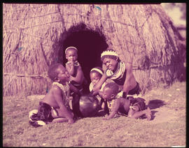 Zululand. Children at traditional hut.