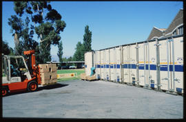 Worcester, 1987. Forklift with containers at South African Dried Fruit.