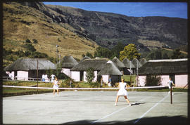 Girls playing tennis in rest camp.