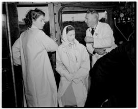 Swellendam, 22 February 1947. Princesses Elizabeth and Margaret with the locomotive inspector on ...