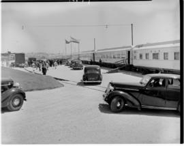 Port Elizabeth, 26 February 1947.Motor cavalcade alongside the Royal Train at Humewood beach.