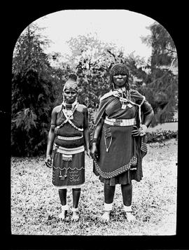Two black women in traditional dress.