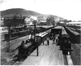 Cape Town, 1893. Station platform showing CGR 6th Class and many trains.