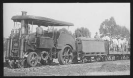 Dutton roadrail tractor No RR973 with passengers with SAR water wagon Type 4-T-1.