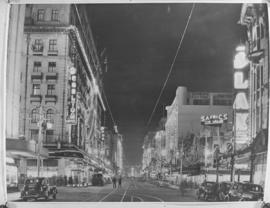 Johannesburg, 1 April 1947. Floodlit city street.