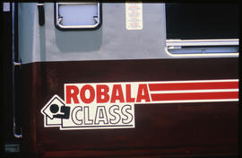 
'Robala Class' logo on side of coach.
