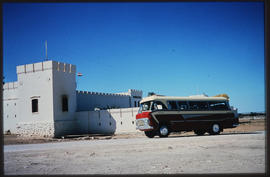 Etosha Game Park, Namibia, 1968. SAR GUY tour bus MT6913 at Fort Namutoni rest camp.