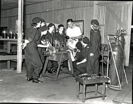 Johannesburg, 1939. Baragwanath airport. Female mechanics of the Women's Aviation Association und...