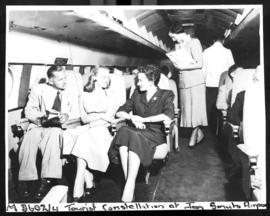 Johannesburg, March 1954. Jan Smuts Airport. SAA Lockheed Constellation interior. Hostess.