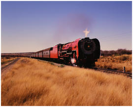 Bloemfontein district, September 1989. SAR Class 26 'Soekie' with passenger train. [D Dannhauser]