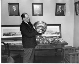 2 October 1942. Mr J Bennett at a Railway Museum display cabinet.