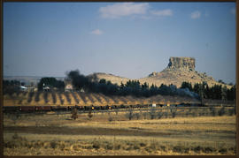 Fouriesburg, August 1987. Goods train passing hill. [D Dannhauser]