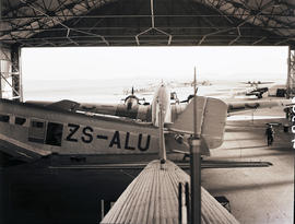 Johannesburg, 1939. Rand airport. Lineup of SAA Junkers aircraft. F13 ZS-AEA 'Hendrik Swellengreb...
