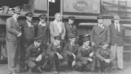 Worcester. Royal Train staff standing next to SAR Class GEA No 4018.