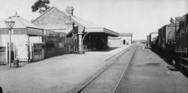 Cookhouse, 1895. Train in station. (EH Short)