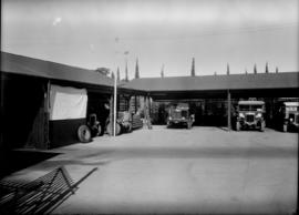 Bremersdorp, Swaziland, 1936. Panoramic view of Road Motor Services depot. Car, bus, truck transp...