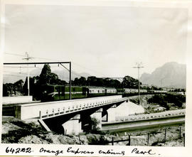 Paarl, 1955. SAR Class ? With Orange Express crossing the N1 on entering town.